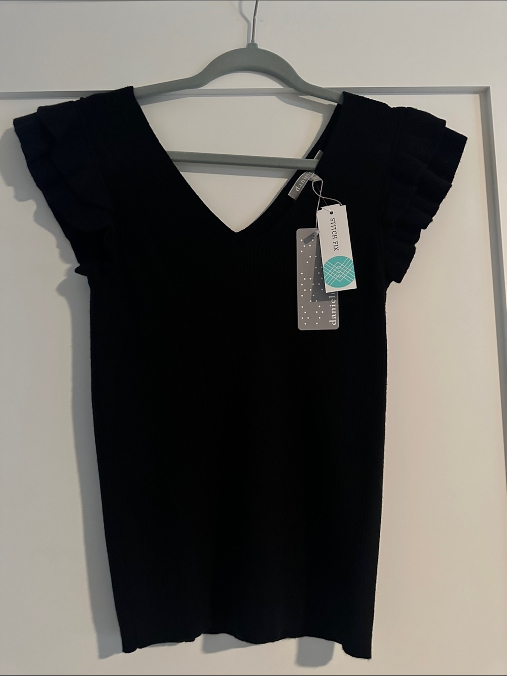 Daniel Rainn Black V-Neck Knit Top with Ruffled Sleeves